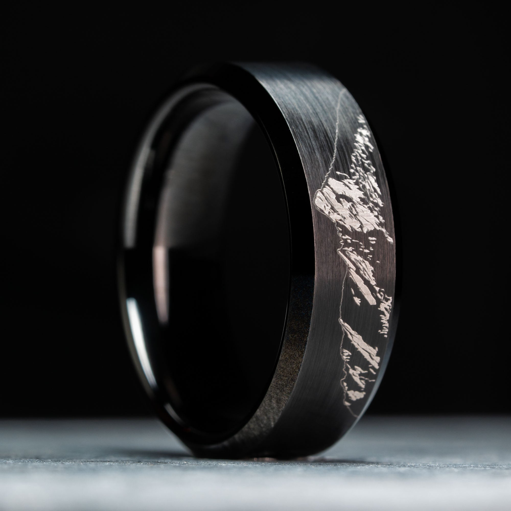 Black Beveled Tungsten Engraved Boulder Flatirons Ring