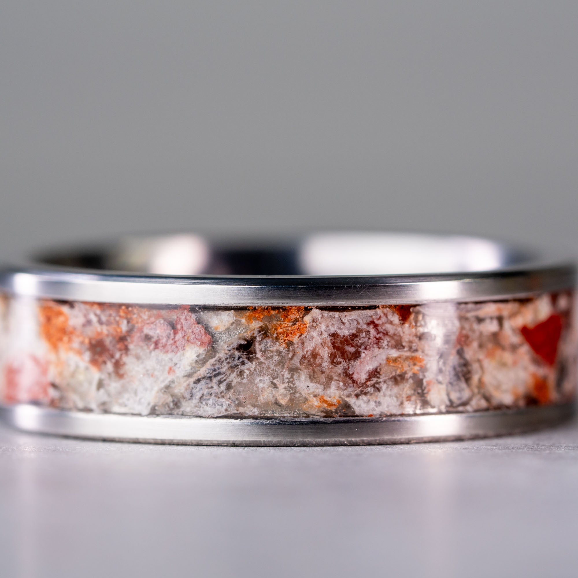 Titanium Michigan Puddingstone Inlay Ring
