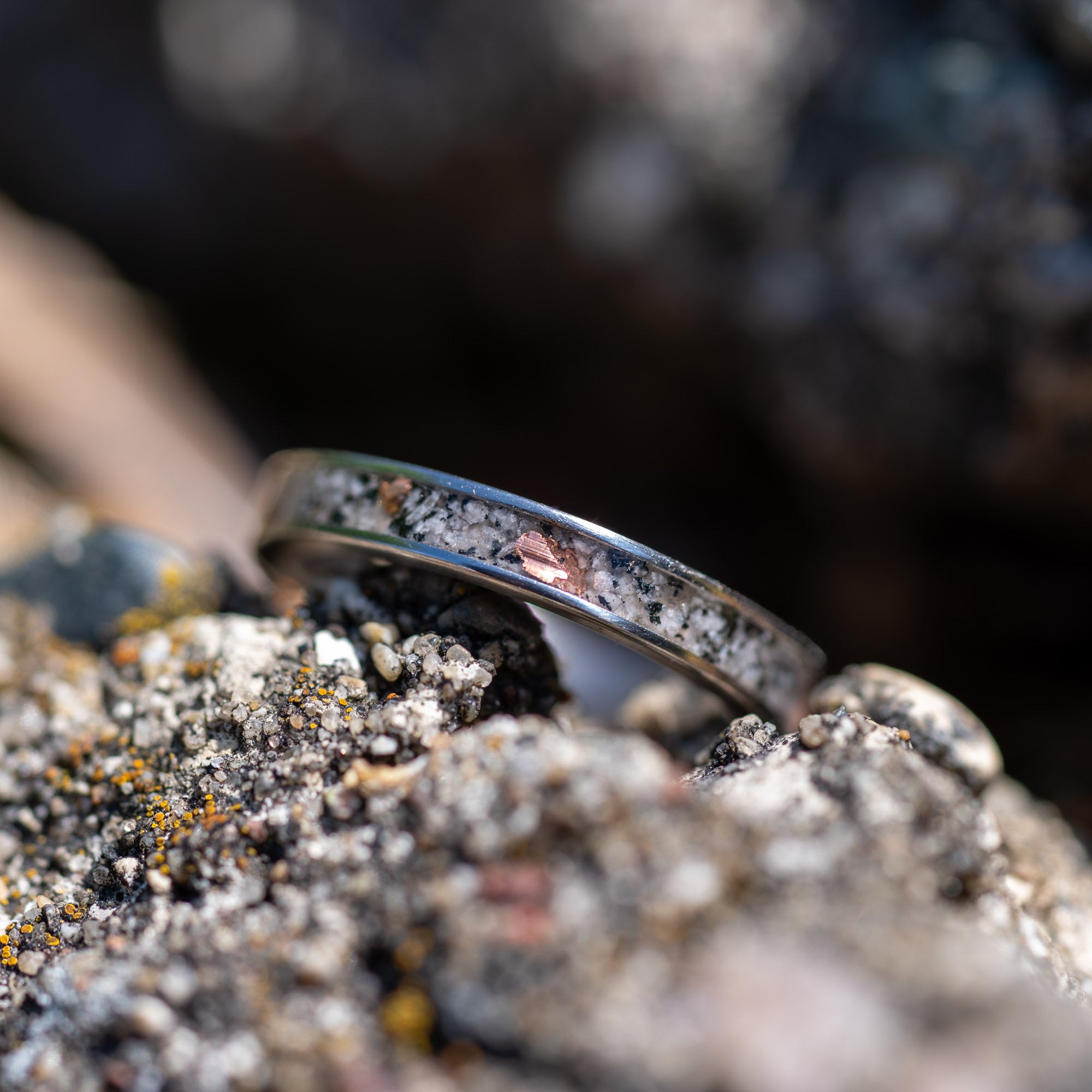 Thin Titanium Yooper Glow Stone & Copper Inlay Ring