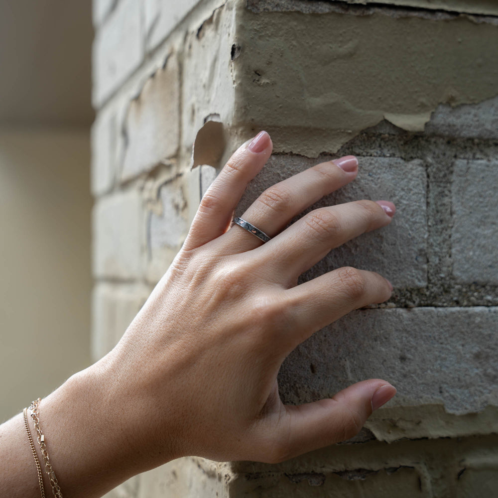 Thin Titanium Yooper Glow Stone & Copper Inlay Ring | Honest Hands Ring Co